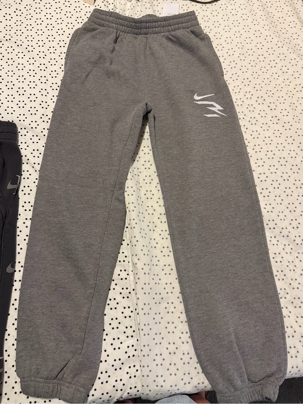 Nike Gray Kids Sweatpants with White Swoosh Accent
